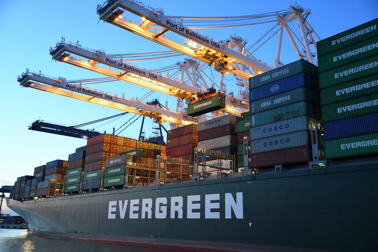 Frieght on a cargo ship with cranes behind at lagos port